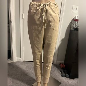 Brand new, elastic waist, drawstring, tan pants